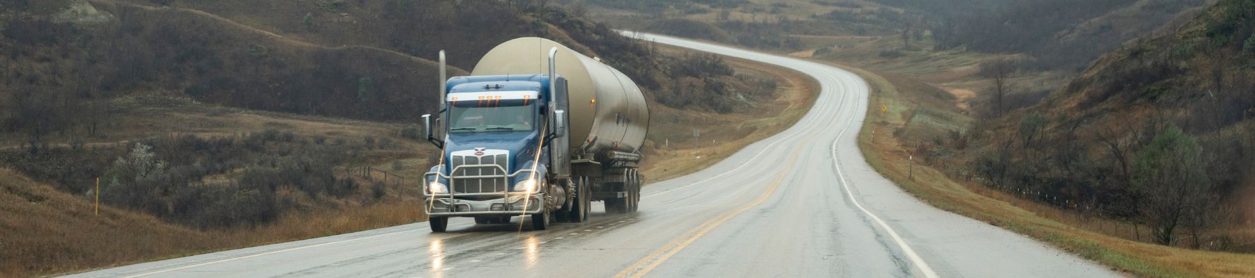 Large truck driving on North Dakota road