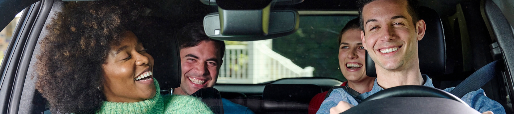 Image of intoxicated group in a car